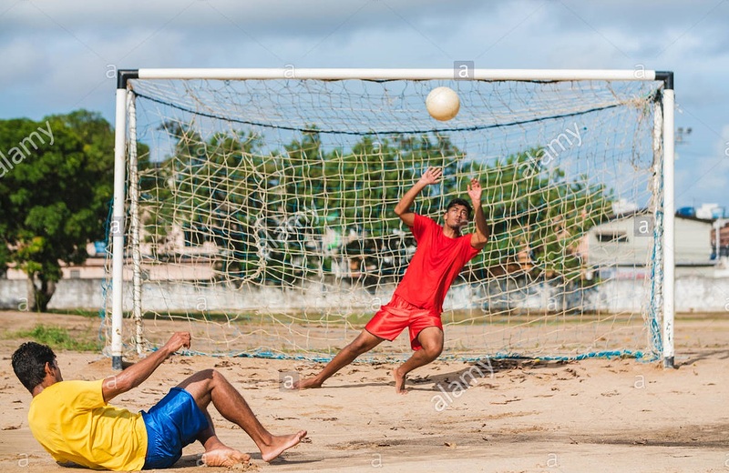 soccer-player-at-the-penalty-in-the-sand-field-in-northeastern-of-pernambuco-brazil-MANB1J